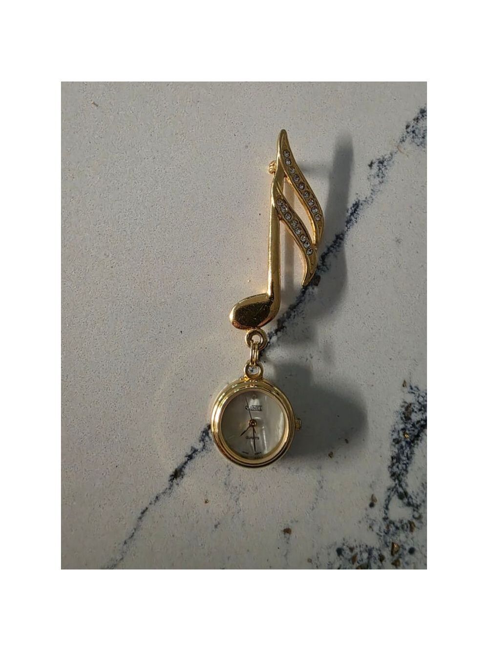 Women's QUINIEL Gold Tone Music Note Brooch Watch, One Size